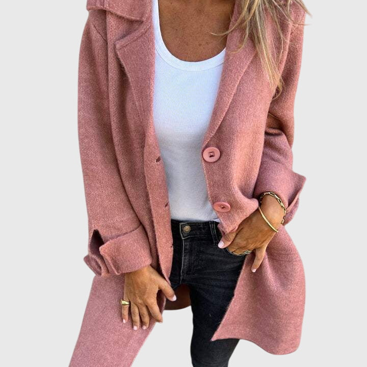 Blazer boutonné rose, col châle, manches longues, poches latérales et boutons devant