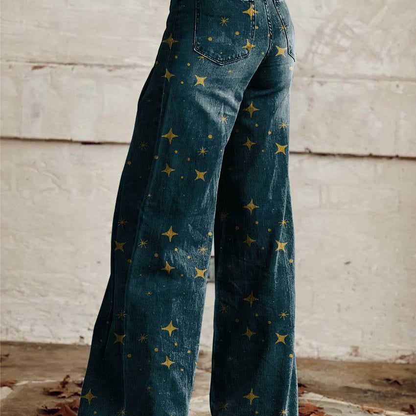 Pantalon denim évasé bleu foncé à motif étoiles jaune, poches arrière et ceinture