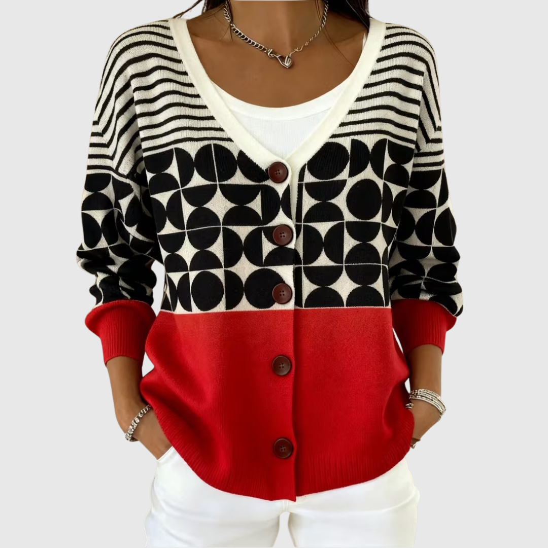 Cardigan en tricot à boutons noir et blanc, devant rouge, manches rayées
