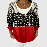Cardigan en tricot à boutons noir et blanc, devant rouge, manches rayées