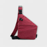Sac à bandoulière anti vol bordeaux avec bandoulière réglable et rabat à bouton