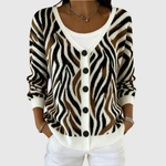 Cardigan en tricot rayé zèbre boutonné, col et poignets blancs, manches longues