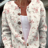 Cardigan en maille claire à imprimé de roses, encolure V et boutons marron, manches longues