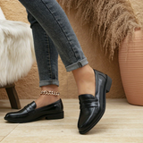 Mocassins classiques en cuir noir, bride à fente et semelle épaisse