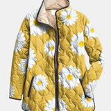 Veste matelassée jaune, motif marguerites blanches, fermeture zippée et col beige.