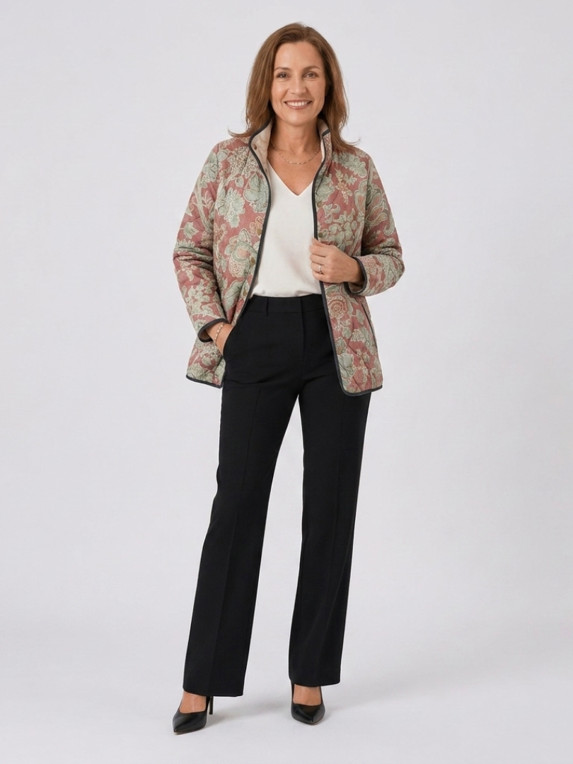 Veste matelassée florale multicolore, manches longues, fermeture zippée et boutonnée.