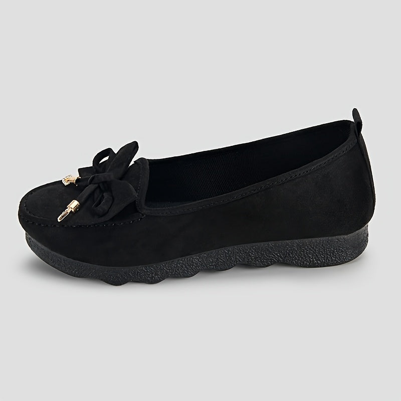 Mocassins noirs en daim à nœud et pampilles décoratives, semelle épaisse