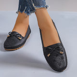Mocassins noirs à lacets avec nœud et coutures décoratives
