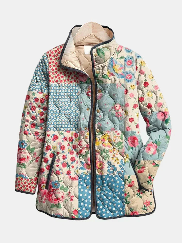 Veste matelassée florale multicolore, col montant, fermeture zippée, coutures en relief