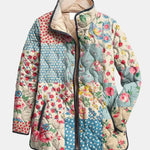 Veste matelassée florale multicolore, col montant, fermeture zippée, coutures en relief