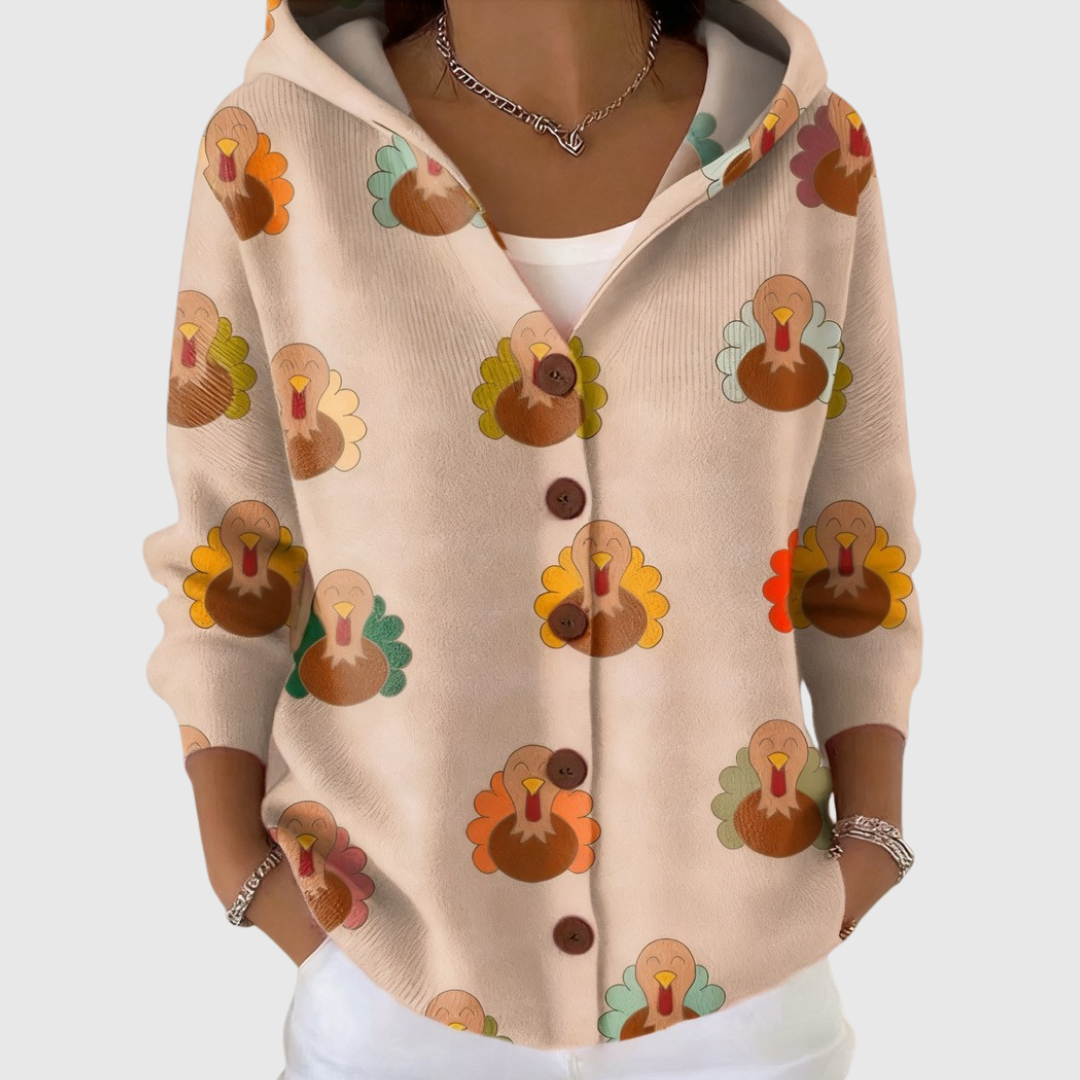 Cardigan à capuche en tricot crème, boutons et motifs poules multicolores