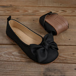 Ballerines à bout arrondi noires à nœud, vue de dessus