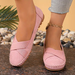 Mocassins roses à bride croisée, dessus texturé et semelle crantée marron