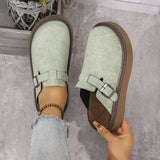 Mocassins vert clair à boucle rectangulaire, semelle brun, vue de dessus.