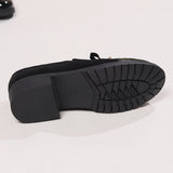 Semelle extérieure des mocassins Nadège noirs, profil antidérapant avec rainures.