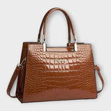 Sac à main en cuir effet crocodile brillant marron, poignées rigides et bandoulière