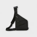 Sac à bandoulière anti-vol noir, bandoulière réglable et poche zippée sur le côté.