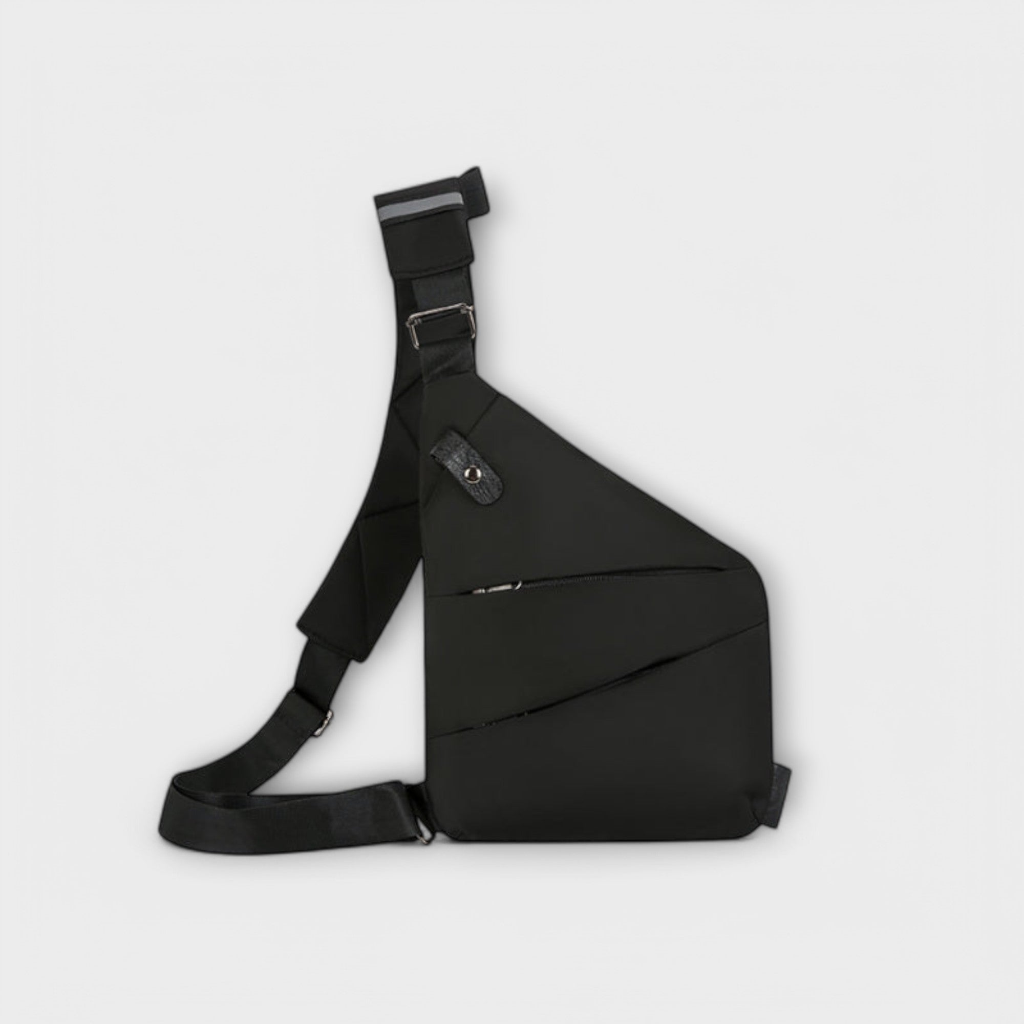 Sac à bandoulière anti-vol noir, bandoulière réglable et poche zippée sur le côté.