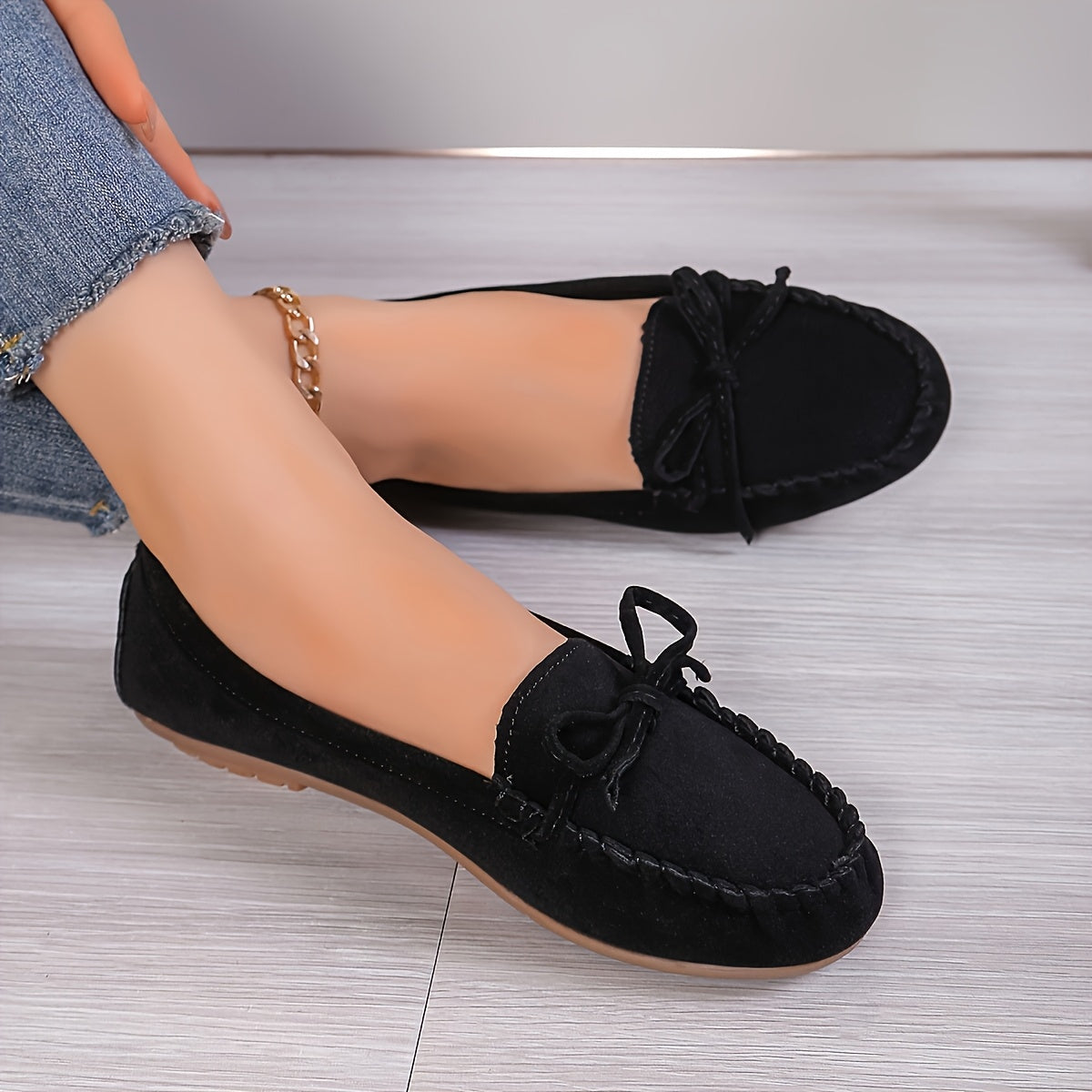Mocassins Flavie noirs à chaîne, nœud et dessus en suède