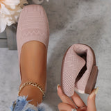 Ballerines en maille tissée rose poudré, bout ouvert et texture ajourée.