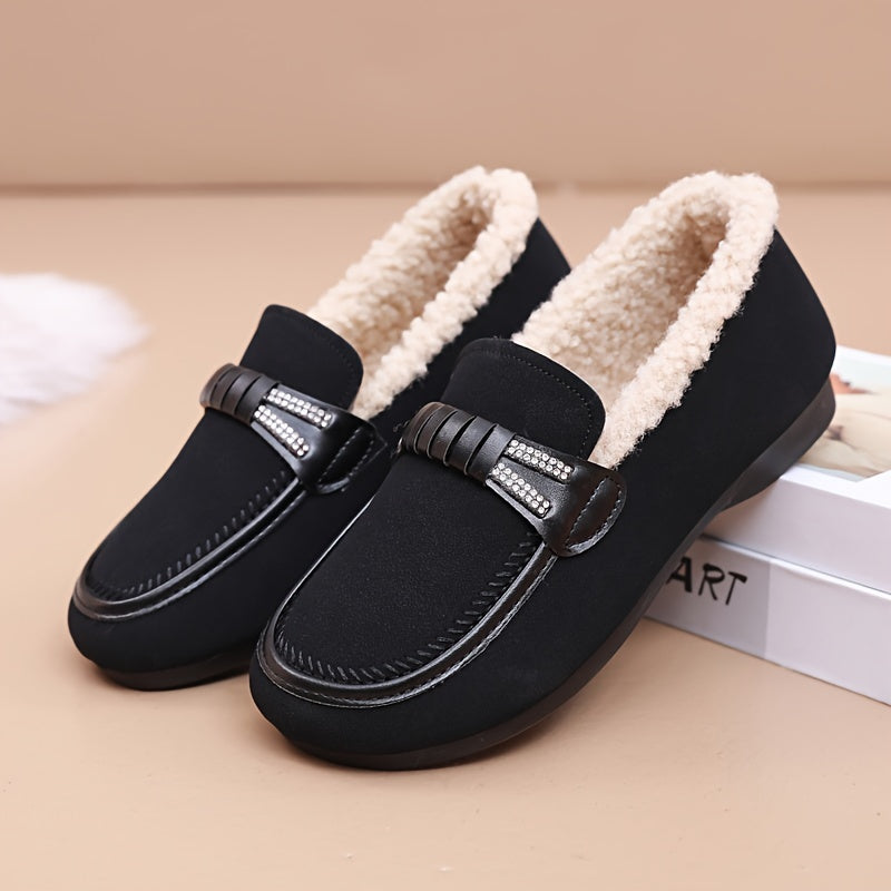 Mules fourrées d’intérieur noires avec bride réglable à strass sur le dessus