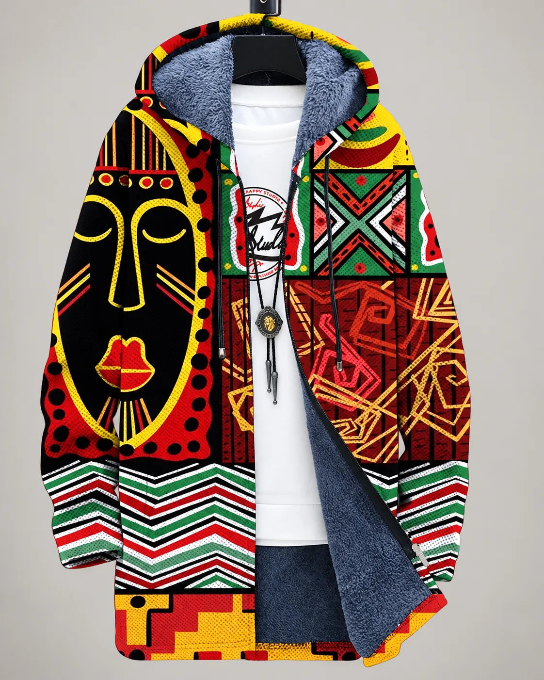 Veste à capuche zippée, imprimé tribal multicolore, doublure polaire bleue.