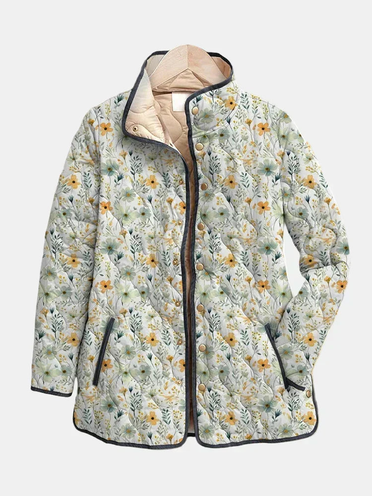 Veste matelassée à capuche, imprimé floral multicolore, fermeture boutonnée, col montant.