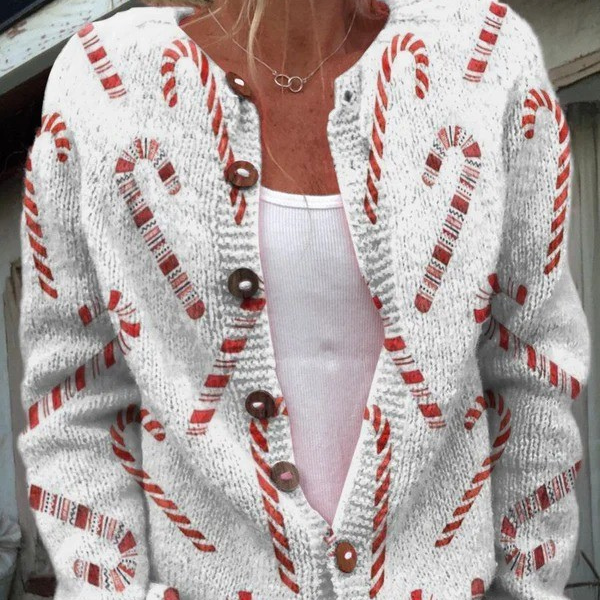 Cardigan festif blanc à motif canne de sucre rouge, boutons, manches longues.