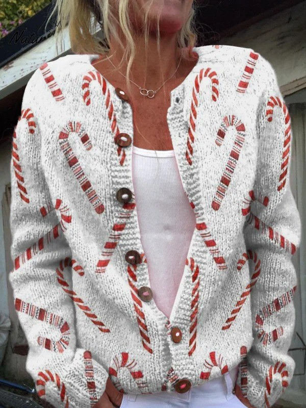 Cardigan festif blanc à motif canne de sucre rouge, boutons, manches longues.