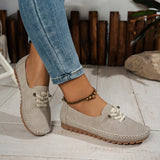Mocassins Ophélie beige clair en daim, lacets ton sur ton et semelle à picots