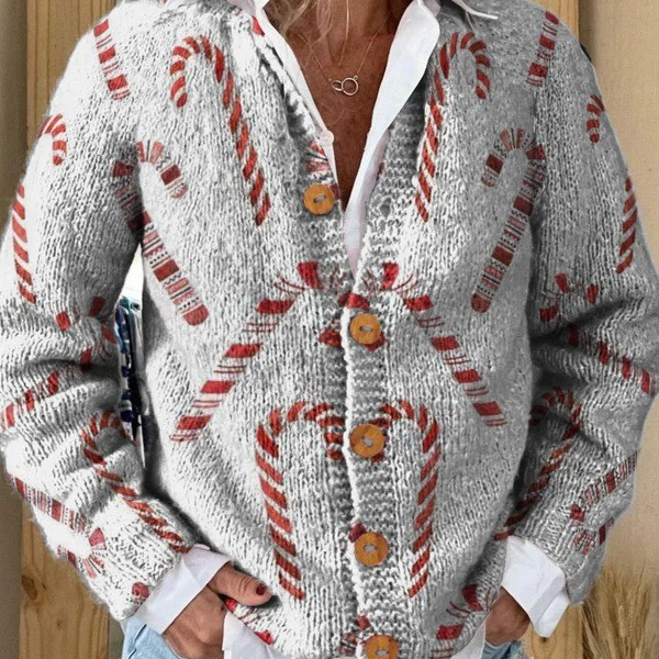 Cardigan festif blanc à motif canne de sucre rouge, col en V, boutons, manches longues.