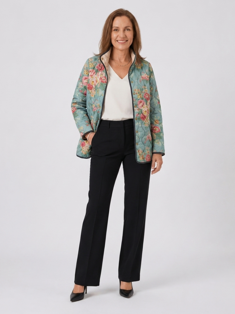 Veste matelassée à imprimé floral multicolore, bleu clair, fermeture boutonnée.