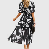 Merlin | Robe Midi Florale Flatteuse