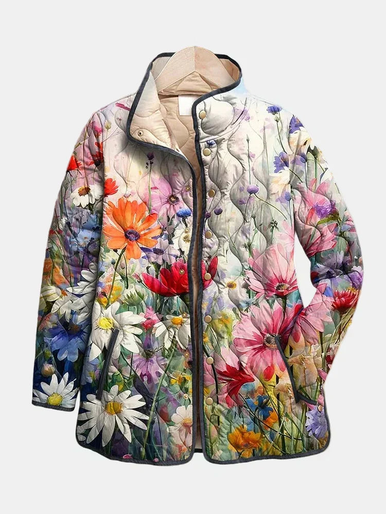 Veste matelassée à imprimé floral multicolore, capuche, fermeture boutonnée.