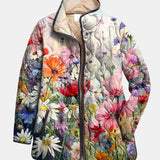 Veste matelassée à imprimé floral multicolore, capuche, fermeture boutonnée.