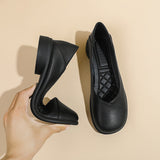 Ballerines noires souples, talon plat, détail de la semelle et de la couture