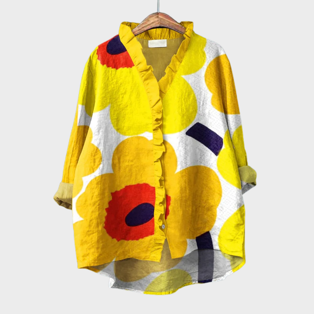 Blouse d’été jaune à motifs fleurs abstraites, encolure volantée et boutons