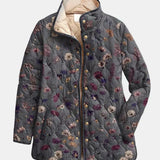Veste matelassée imprimé floral multicolore, fermeture boutonnée, col montant, manches longues.