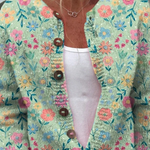 Cardigan tricot multicolore à fleurs, col V et boutons en bois, manches longues.