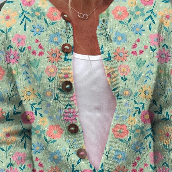 Cardigan tricot multicolore à fleurs, col V et boutons en bois, manches longues.
