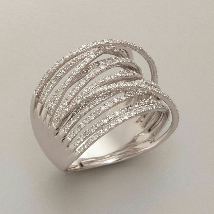 Bague argent vintage à rangs de zircons, anneaux superposés effet étagé.