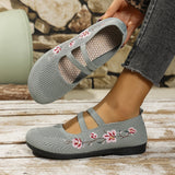 Chaussures plates en tissu gris clair à brides et broderies florales rouges