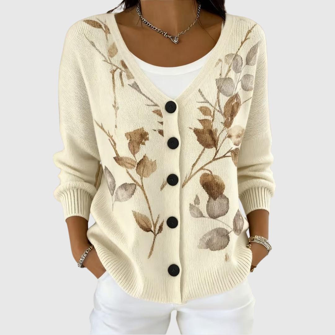 Cardigan en tricot crème à encolure V, boutons noirs et motif floral ton sur ton
