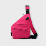Sac à bandoulière anti-vol fuchsia, sangle réglable et poche latérale zippée.