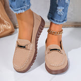 Mocassins beiges à boucle métal, semelle épaisse brune et coutures