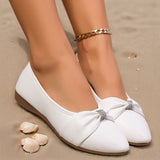 Ballerines blanches à nœud bijou strass sur l’empeigne, semelle marron