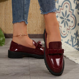 Mocassins vernis bordeaux à semelle épaisse, bride à boucle, bout verni