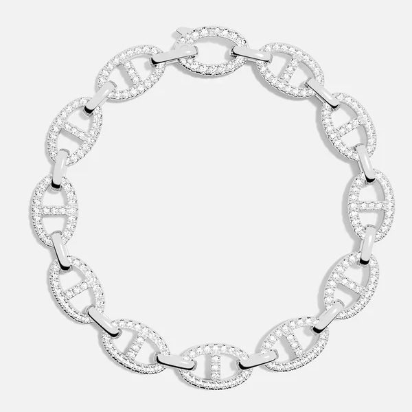 Bracelet en or blanc à maillons ovales sertis de pierres, fermoir au centre