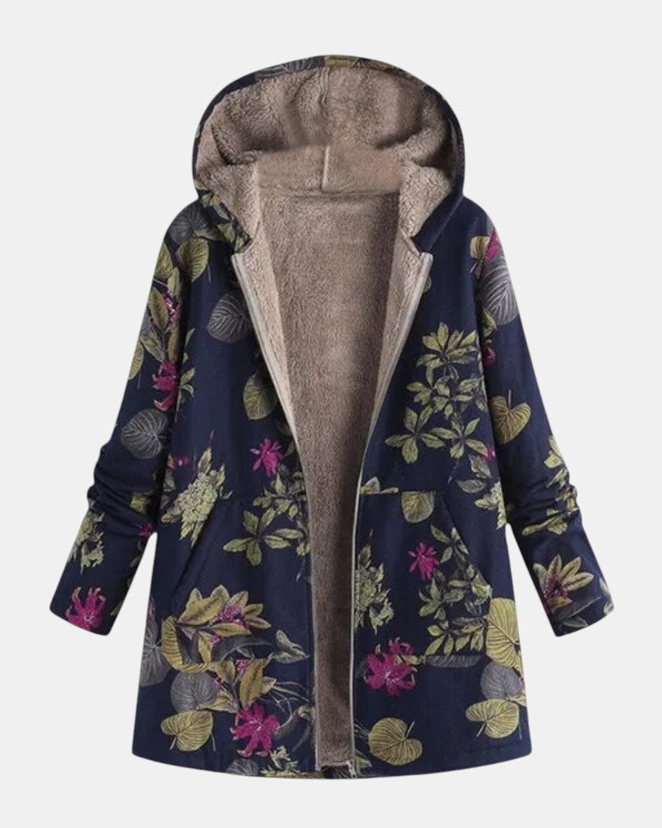 Manteau bleu marine à capuche, doublure beige et motif floral sur l’avant
