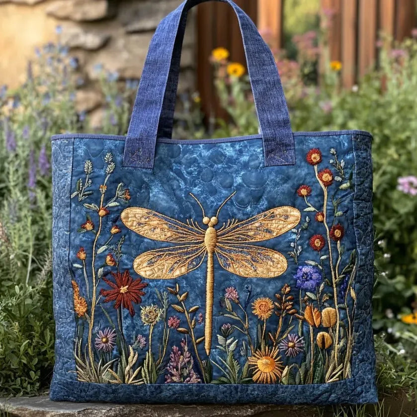 Sac matelassé bleu avec libellule dorée, fleurs brodées multicolores, anses en tissu